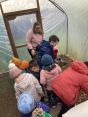 The ECO Council and Nursery Children plant vegetables!